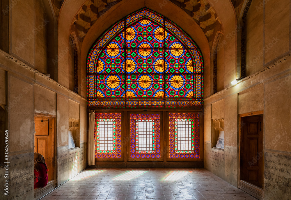 Beautiful colored glass windows in the palace of Arg of Karim Khan or Citadel in downtown Shiraz, Fars Province, Iran. Heritage and tourist attraction.