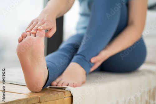 Relaxing woman, female feet close-up, foot care concept