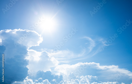 Beautiful blue clear sky with white cloud and sunshine background.