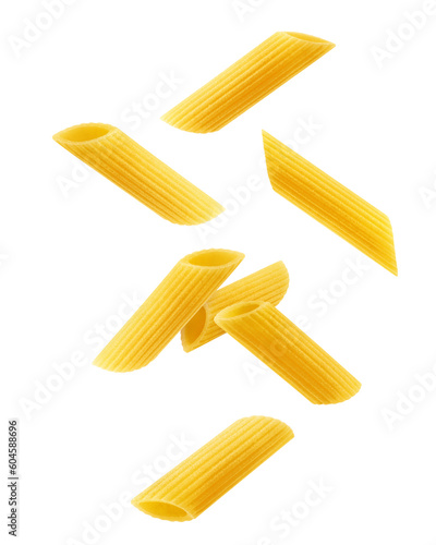 Papier peint Falling raw Penne Rigate, uncooked Italian Pasta, isolated on white background,