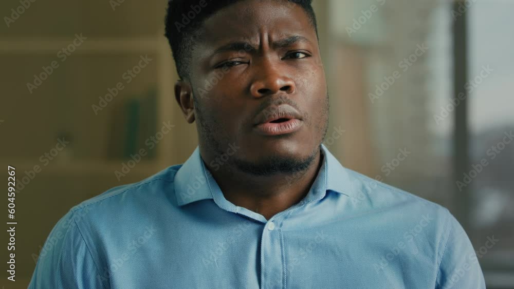 Portrait shocked stressed African American man male businessman entrepreneur employer waving head no negative bad result unsure disbelief stress at office anxious worried ethnic guy job loss despair Portrait shocked stressed African American man male businessman entrepreneur employer waving head no negative bad result unsure disbelief stress at office anxious worried ethnic guy job loss despair