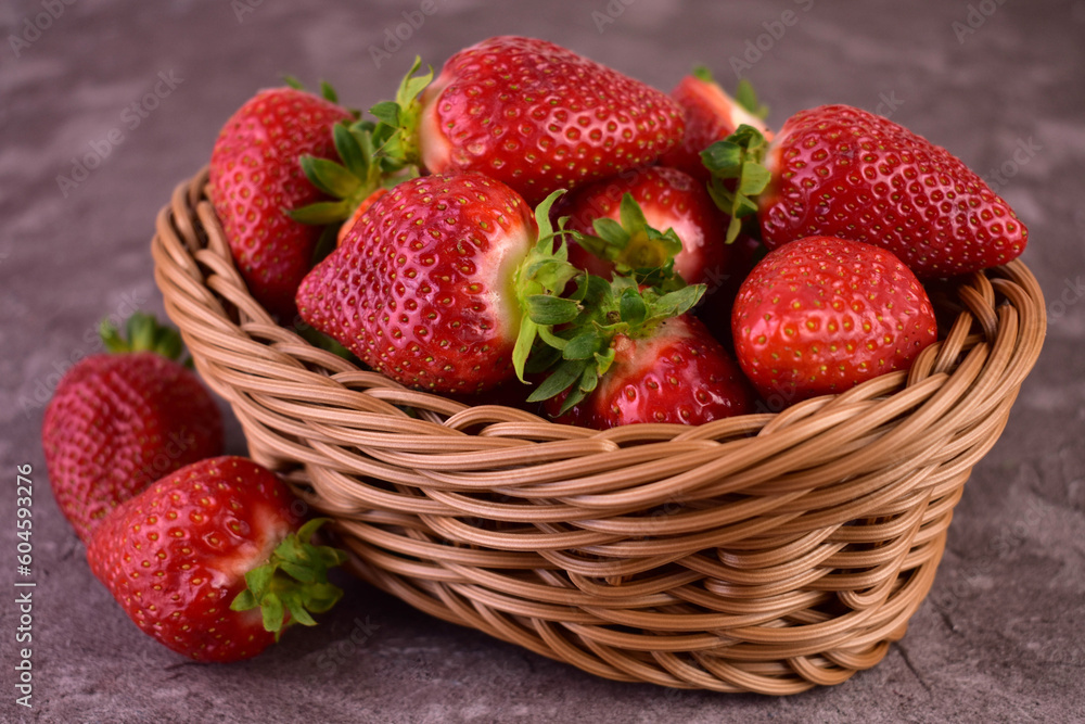 Fresh strawberries in a wicker basket.Close-up.
Fresh strawberries in a wicker basket.Close-up.
