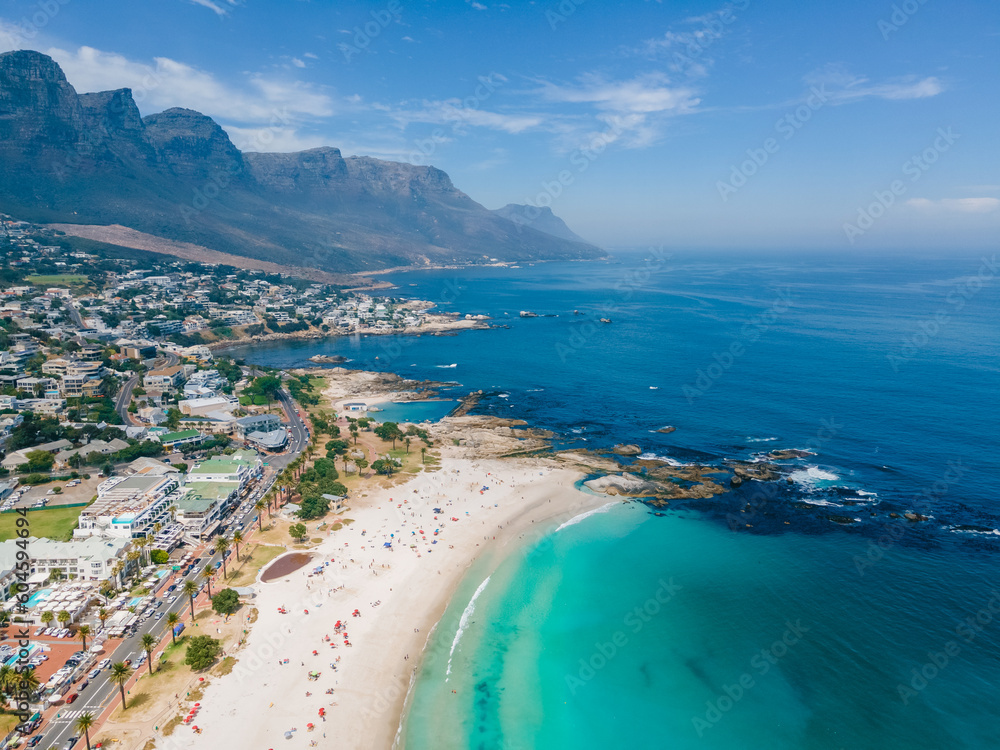 custom made wallpaper toronto digitaldrone aerial view over Camps Bay Cape Town , Camps Bay beach drone aerial view during summer in Cape Town Sout Africa, drone view at the beach during summer