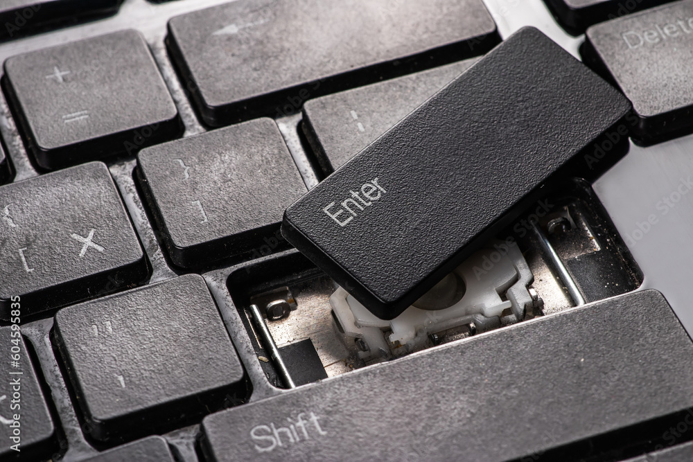 A broken old laptop keyboard close up A broken old laptop keyboard close up