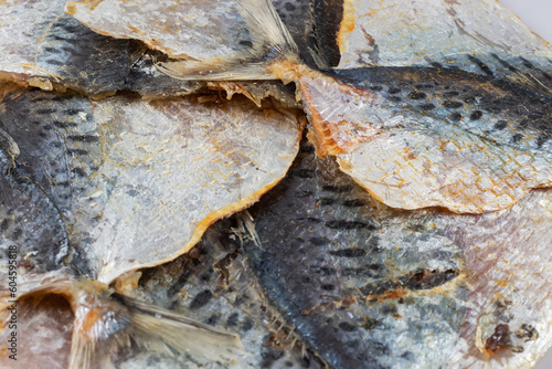 Dried yellowstripe scad fishes. snack for beer photo