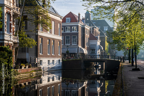 Reflections on Mauritskade: Tranquil Waters and Urban Charms