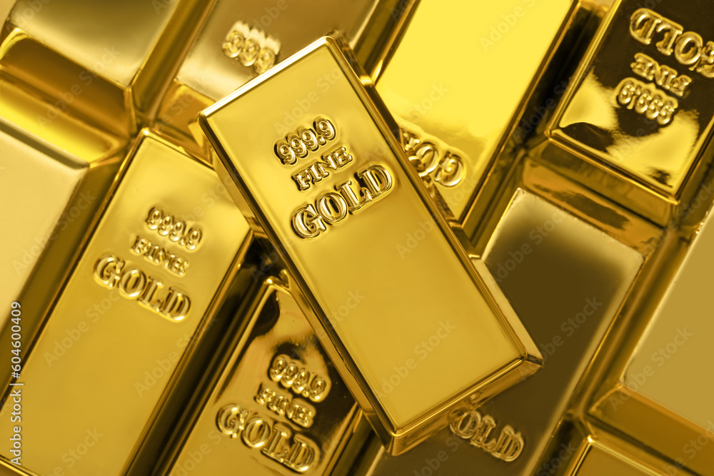 Many shiny gold bars as background, top view Many shiny gold bars as background, top view