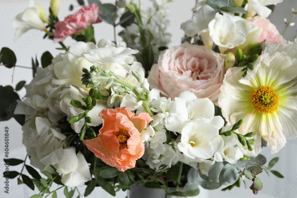 Bouquet of beautiful flowers on light background, closeup Bouquet of beautiful flowers on light background, closeup