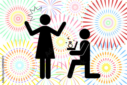 A silhouette of a man proposing to a woman with fireworks in the background. Love fulfillment concept.