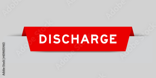 Red color inserted label with word discharge on gray background