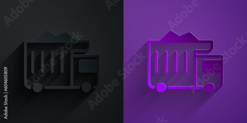 Paper cut Large industrial mining dump truck icon isolated on black on purple background. Big car. Paper art style. Vector