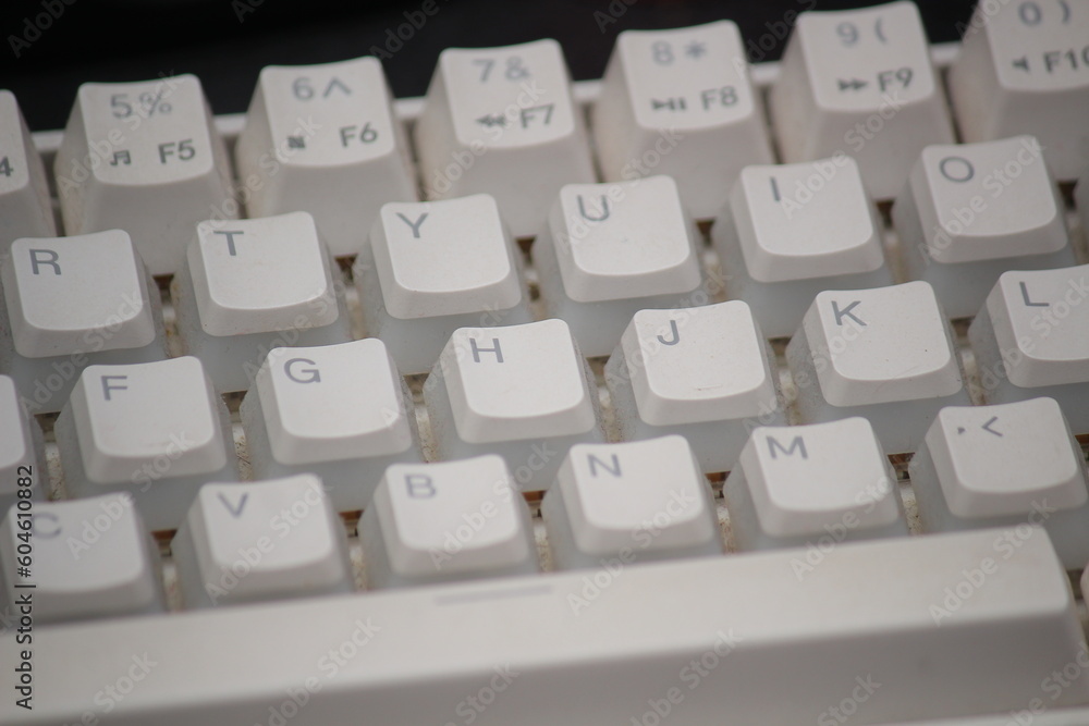 dirty keyboard close up, white mechanical keyboard, dusted dirty keyboard close up, white mechanical keyboard, dusted