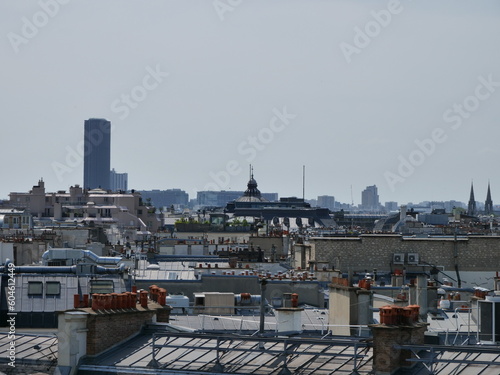 parisian rooftops with chimneys

