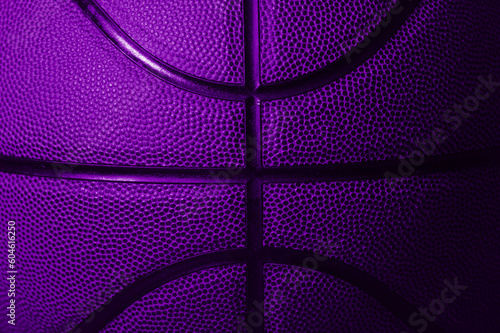 Closeup detail of purple basketball ball texture background. Horizontal sport theme poster, greeting cards, headers, website and app © Augustas Cetkauskas