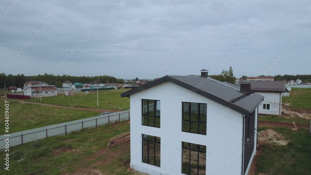 Aerial photography of a new private house, exterior of a private house, new cottage, construction of cottages, cottage in nature Aerial photography of a new private house, exterior of a private house, new cottage, construction of cottages, cottage in nature