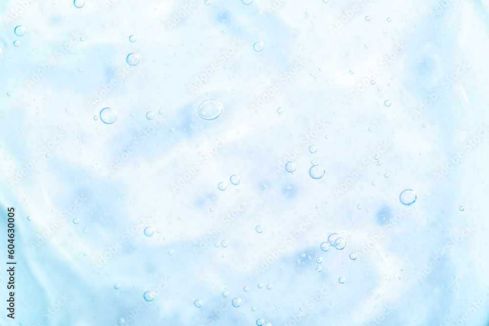 Cosmetic gel, serum transparent sample. Liquid cream with bubble texture. Gel texture of a cosmetic product. Clear liquid lotion for skin care. Cosmetic gel, serum transparent sample. Liquid cream with bubble texture. Gel texture of a cosmetic product. Clear liquid lotion for skin care.