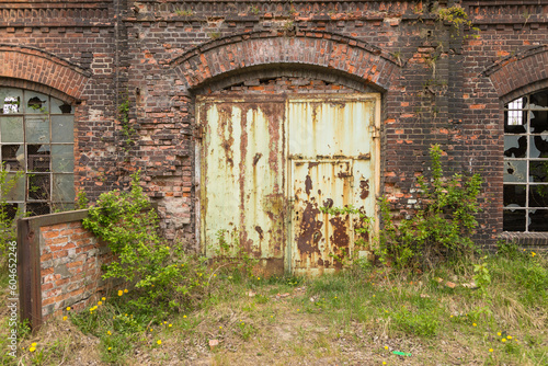 The Imperial Shipyard Trail - high gate of abandoned destroyed hall. Gdansk  Poland.