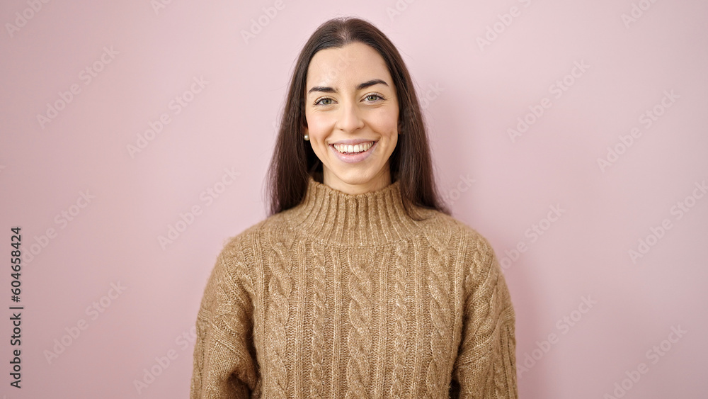 Young beautiful hispanic woman smiling confident standing over isolated pink background Young beautiful hispanic woman smiling confident standing over isolated pink background