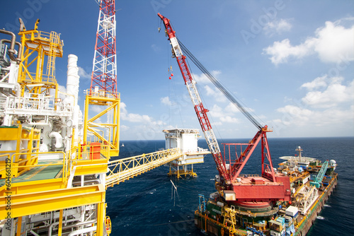 The installation oil and gas platform project in the gulf or the sea by crane barge. The project was support oil and gas industry. The heavy lift was performed by high technical and engineering.