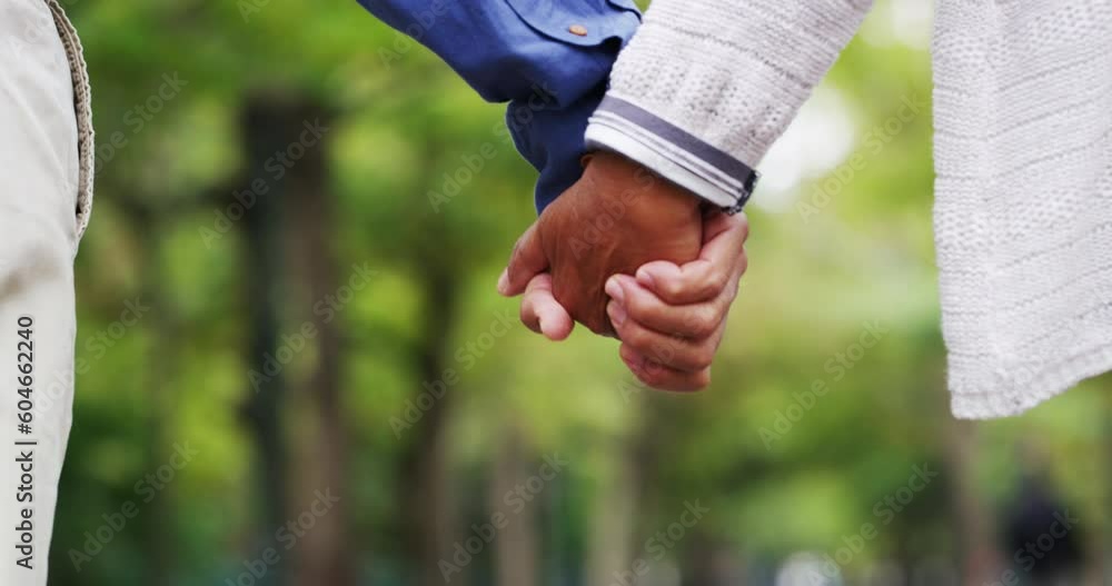 Love, senior couple holding hands and walking in a nature park outdoors ...