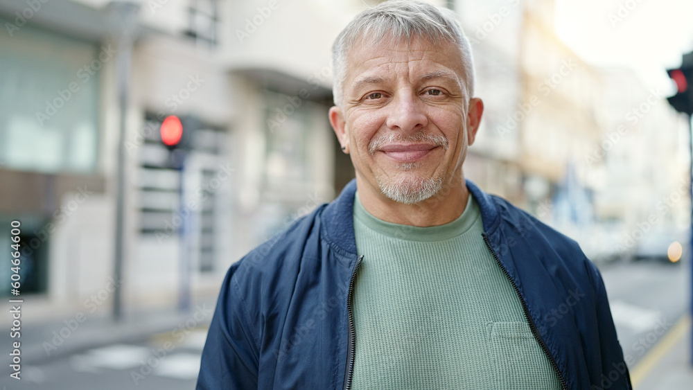Middle age grey-haired man smiling confident standing at street Middle age grey-haired man smiling confident standing at street