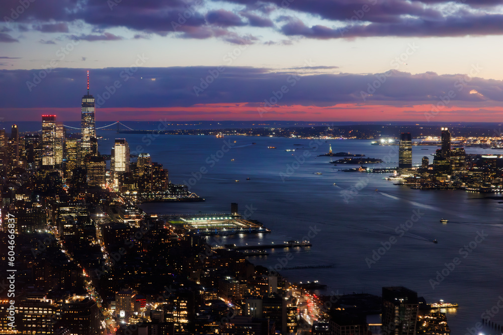 Sunset over city skyline and bay