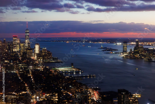 Sunset over city skyline and bay