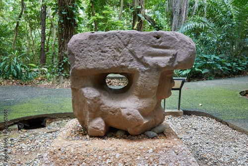 The outdoor museum of Parque Museo La Venta in Tabasco, Mexico, showcases ancient Olmec heads and other basalt carvings photo