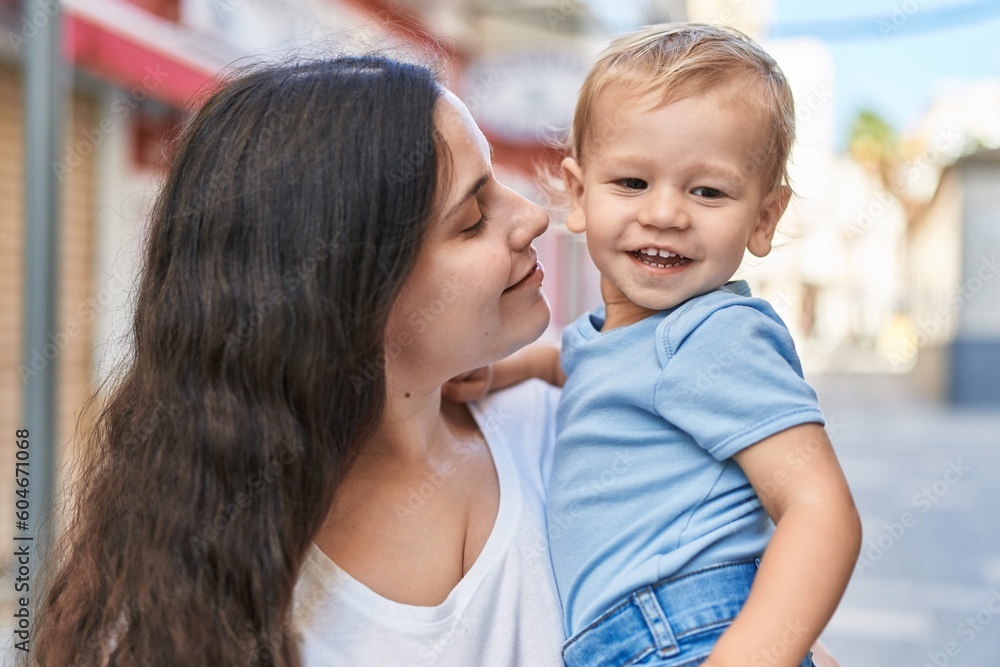 Mother and son smiling confident standing at street Mother and son smiling confident standing at street