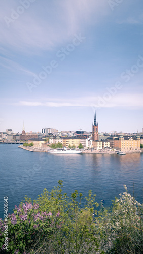 Panoramic view of Riddarholmen and Riddarholmskyrkan and Stockholm old town on warm spring day in Sweden