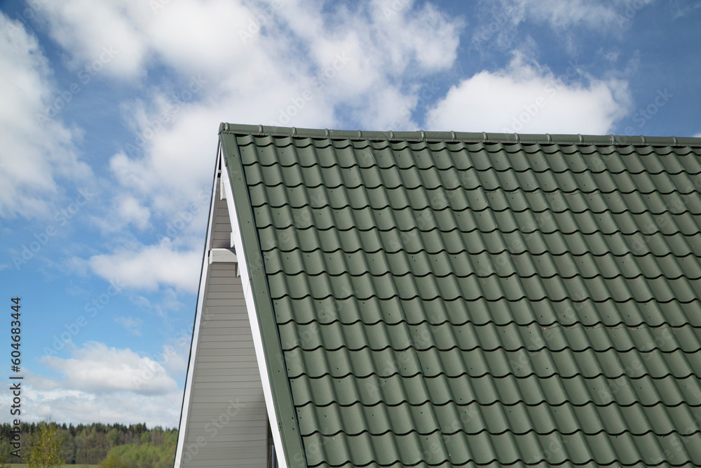 Metal tile.Roof for the house. Modern coatings for the roof of the house.