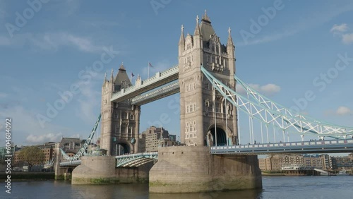 Tower Bridge and Thames River United Kingdom static camera footage. UK Iconic Tower Bridge Summer evening. Tripod Shot of London landmark Towerbridge England which beautiful and full of historical photo