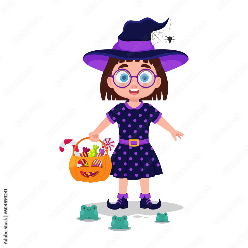 Cute girl in witch costume with candy Cute girl in witch costume with candy
