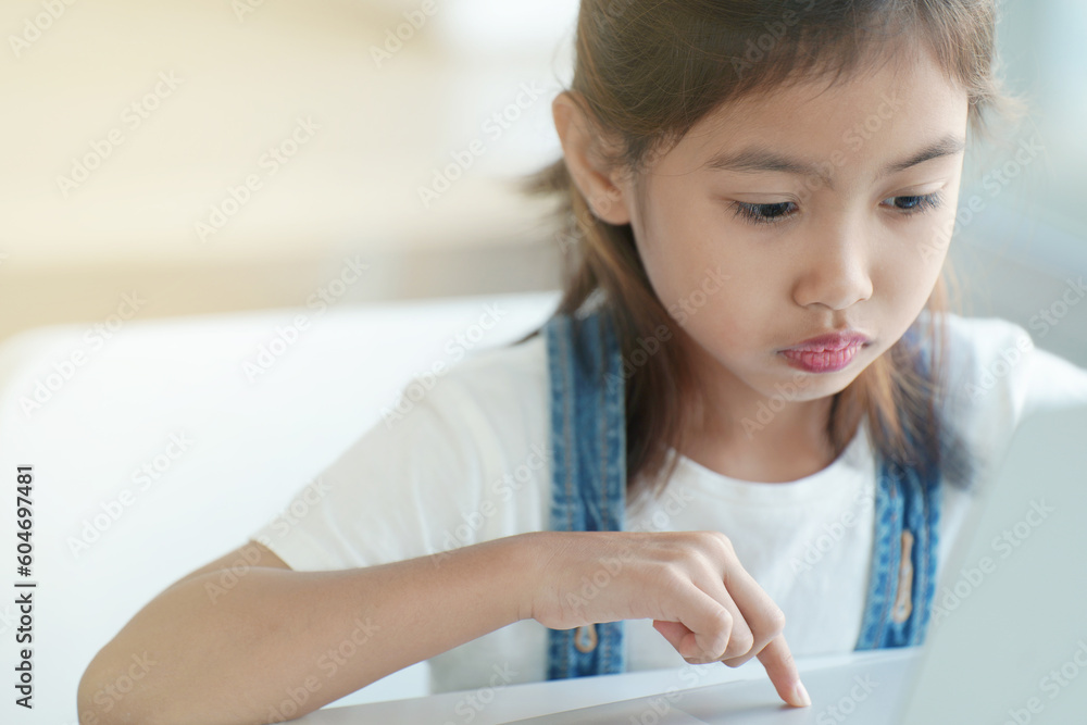 The girl is studying online at home. The girl is studying online at home.