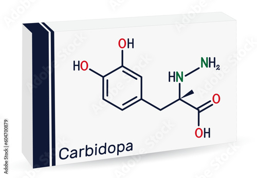 Carbidopa molecule. It is dopa decarboxylase inhibitor used for treatment of idiopathic Parkinson disease. Skeletal chemical formula. Paper packaging for drugs.