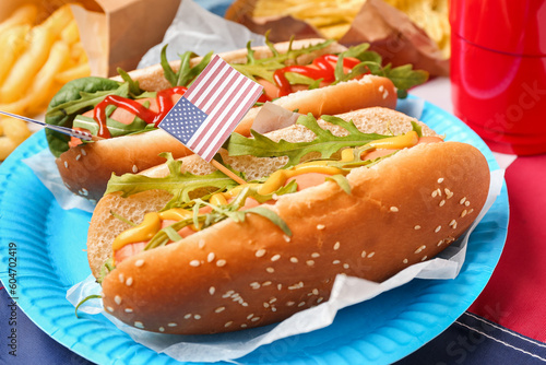 Photography Plate with tasty hot dogs on table, closeup
