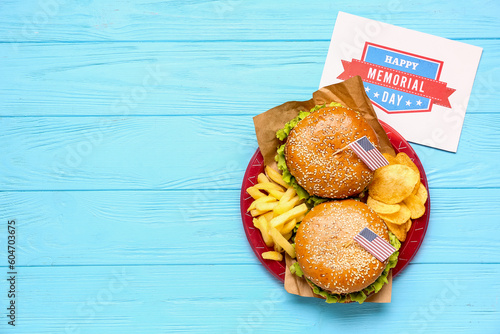 Plate with tasty burgers, f...