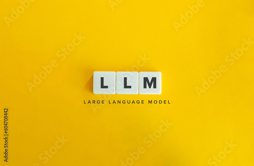 Large Language Model (LLM). Block Letter Tiles on Yellow Background. Minimal Aesthetics. photo