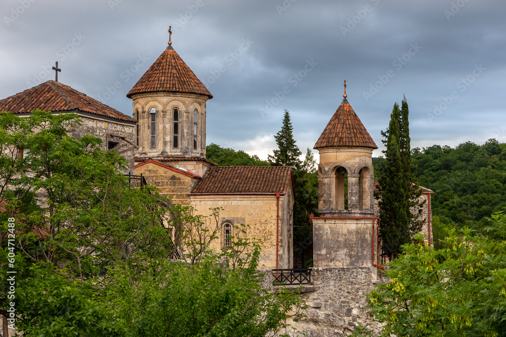 Motsameta monastery, XI century medieval stone orthodox church located on a cliff among lush forests in Georgia, Imereti Region.