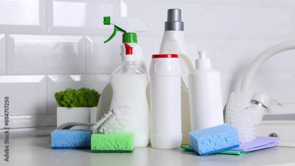 A set of different cleaning and disinfection products against the background of the home interior A set of different cleaning and disinfection products against the background of the home interior