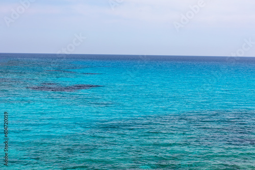 Calm turquoise sea water . Blue seascape background