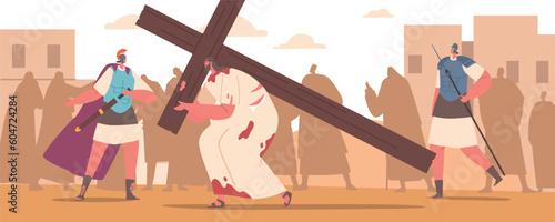 Jesus Character Carries A Wooden Cross On His Shoulders Towards His Crucifixion. He Is Surrounded By Roman Soldiers