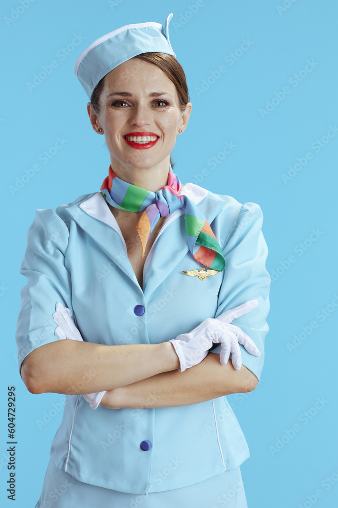smiling elegant flight attendant woman on blue smiling elegant flight attendant woman on blue