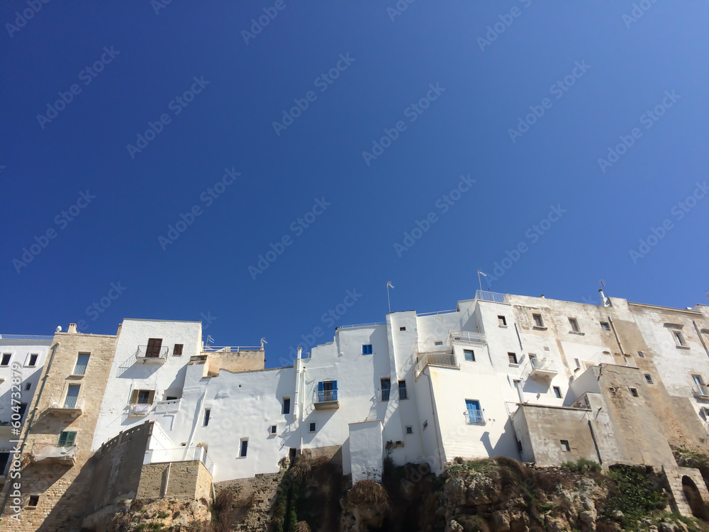 Old houses on rocks in Polignango a Mare, Puglia, Italy