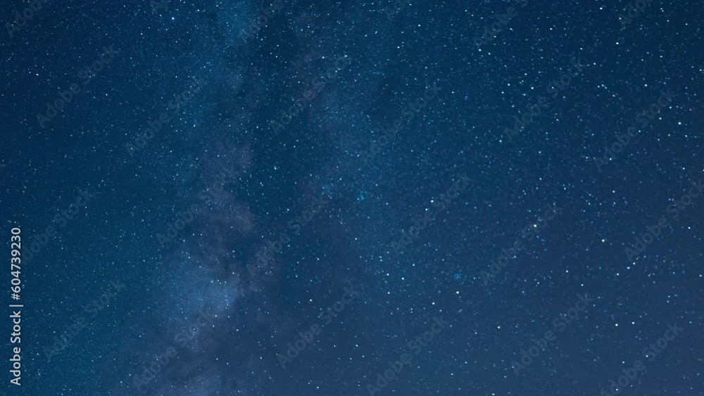 Time lapse of a starry night sky clouds