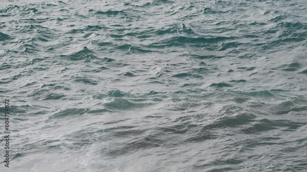 Slow motion restless mediterranean sea background shot Slow motion restless mediterranean sea background shot