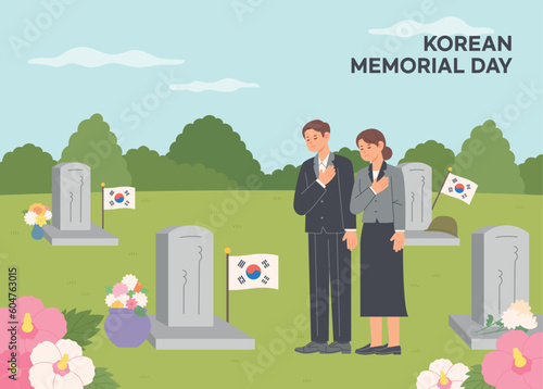 South Korea Memorial day. Two people are praying in silence at the memorial park cemetery. June 6