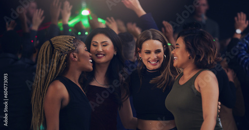 Dance, party and night with women in club for music, celebration and nightlife concert. Festival, disco and rave with friends dancing in crowd at social event for energy, techno and dj show