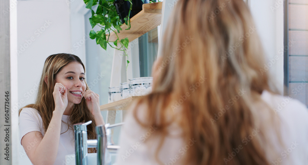Mirror, dental floss and girl in a bathroom for cleaning, hygiene and