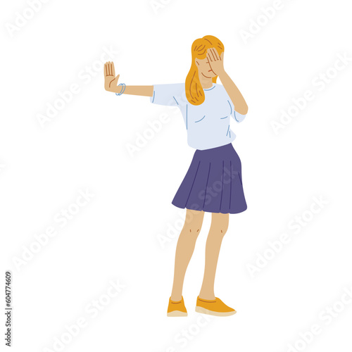Standing woman covers face with hand and puts palm out flat style